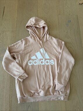 Adidas women’s light pink Hoodie with side pockets